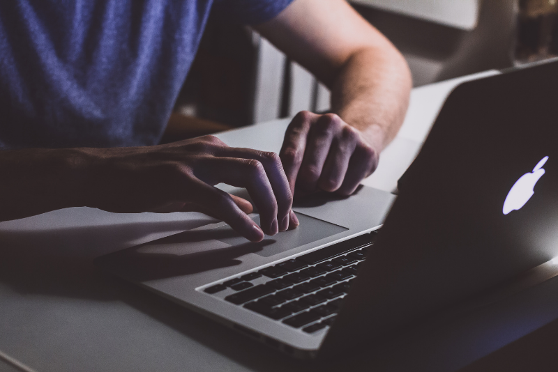 Man working on a laptop.