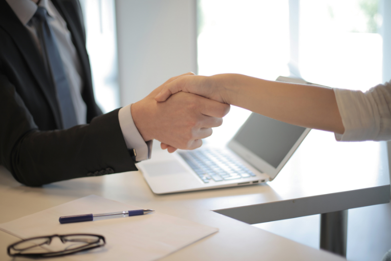 A handshake in an office