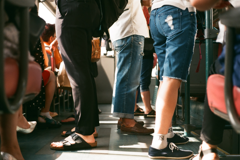 Workers standing on the train.